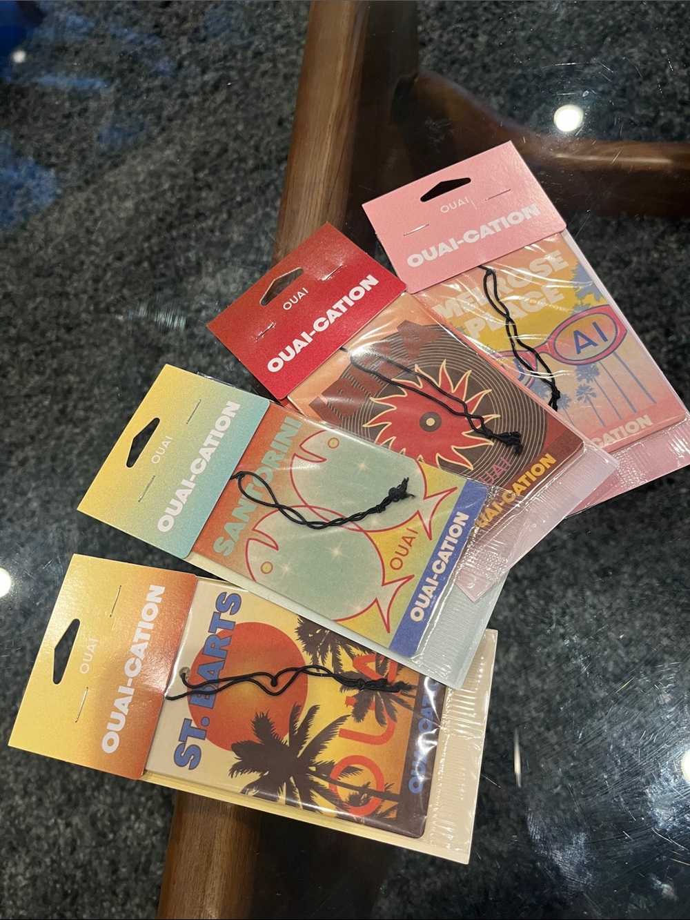 OUAI St. Barts Air Freshener in Orange, Yellow, Red, Blue, Black